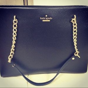 Kate Spade black leather bag with gold hardware.